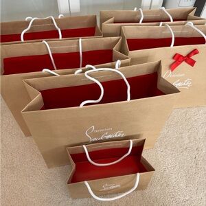 Louboutin shopping bags